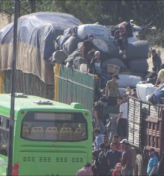 استمرار التحضيرات لبدء عملية التهجير في الغوطة الغربية